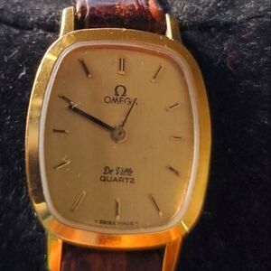 OMEGA DE VILLE STEEL GOLD PLATED QUARTZ SMALL LADIES WRIST WATCH (27 MM) series: